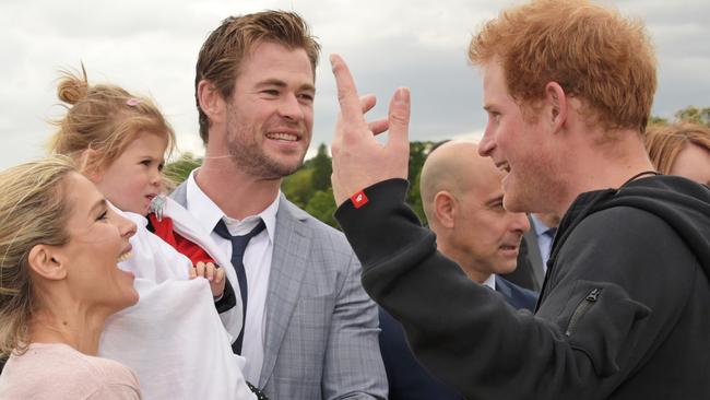 Charity games ... Elsa Pataky, daughter India Rose Hemsworth, Chris Hemsworth and Prince Harry attend day two of the Audi Polo Challenge. Picture: Getty