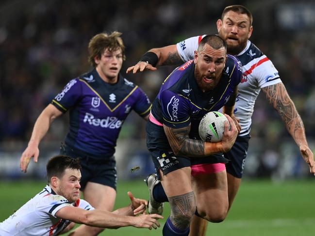 Nelson Asofa-Solomona of the Storm is tackled by Luke Keary of the Roosters. Picture: Quinn Rooney/Getty Images