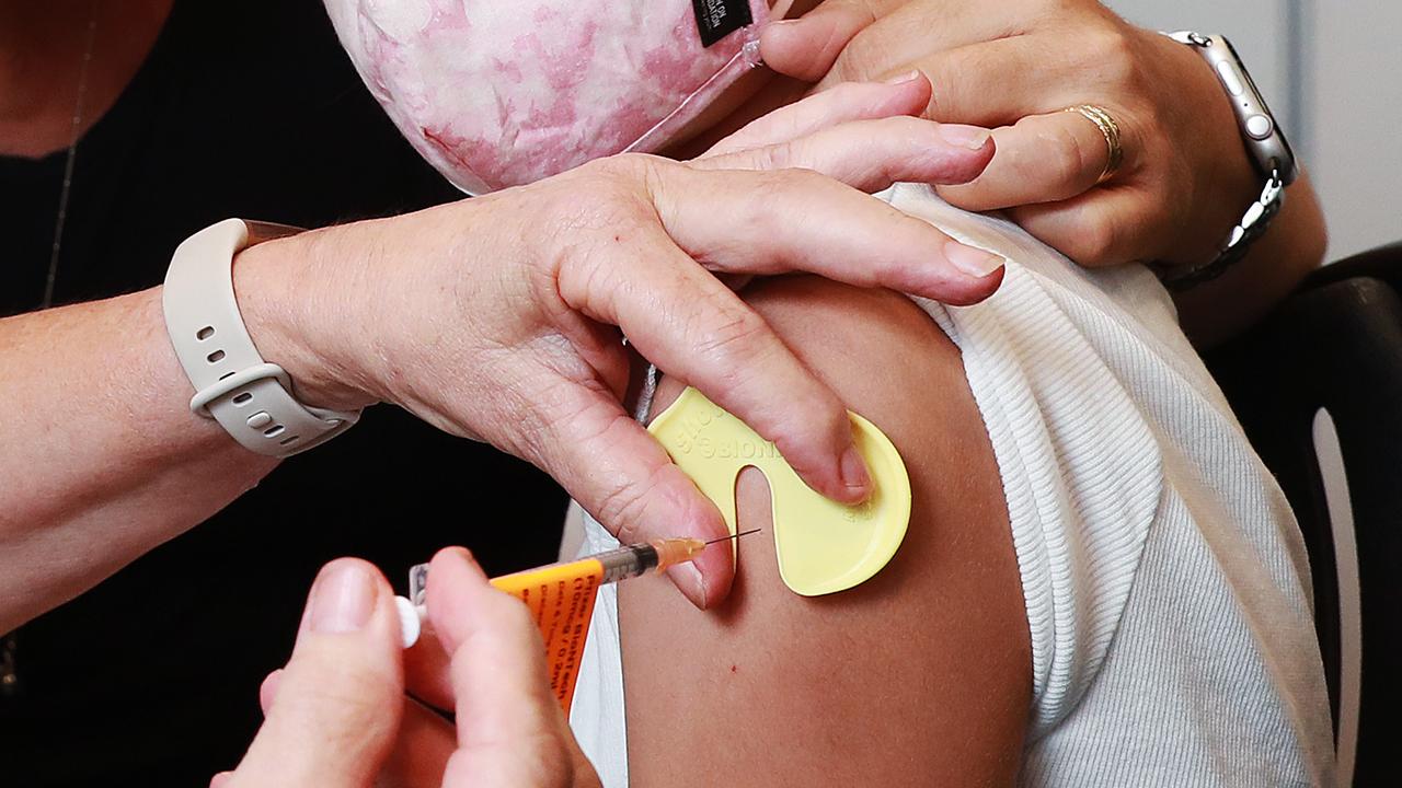 An 11-year-old girl receives the Pfizer vaccine in Cairns. Picture: Brendan Radke