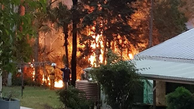 The rural fire service carries out a hazard reduction burn near houses in The Palms in May this year. Pictures: The Palms Rural Fire Brigade