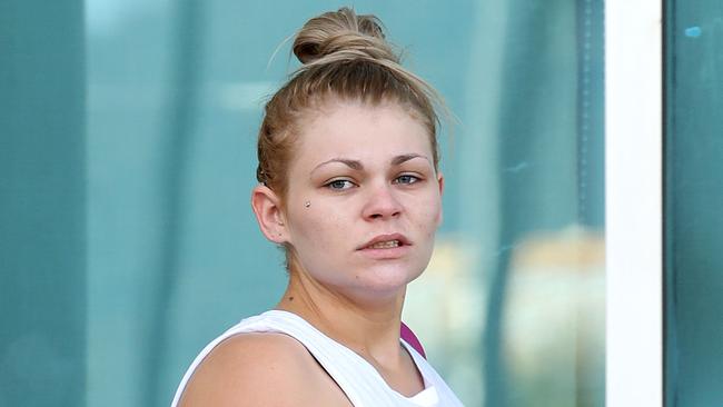 Georgia Tanya Herrmann, 20, leaves Cairns Magistrates Court. She was granted bail for alleged drug trafficking as part of police drug squad Operation Oscar Burin.