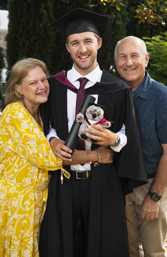 Bachelor of Surveying with First Class Honours graduate Kyran Cook awarded a University Medal is congratulated by parents Gail and Bob Cook at a UniSQ graduation ceremony at The Empire, Wednesday, October 30, 2024. Picture: Kevin Farmer