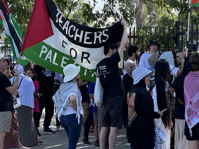 Dozens of teachers, students and parents attended a snap protest outside Condell Park High School after the school banned a student from attending his Year 12 formal for wearing a Palestinian keffiyeh. Picture: Canterbury Bankstown Express