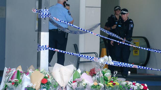 Flowers in tribute to Vyleen White, 70, of Redbank Plains, who was stabbed in the chest in the car park at Town Square Redbank Plains Shopping Centre. Picture: Glenn Campbell/NCA NewsWire.