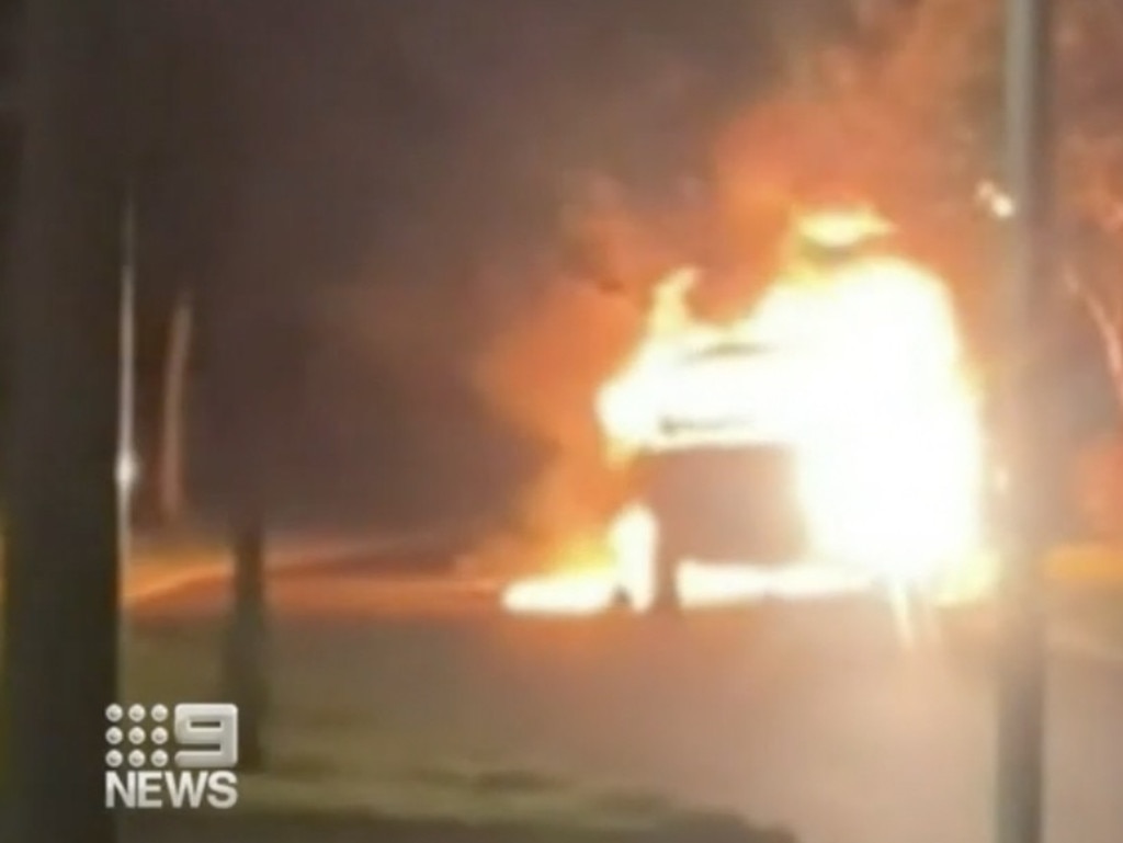 The getaway car was captured in flames following the shooting. Picture: Supplied/Nine News.