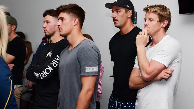 Crows players including Luke Brown, Riley Knight, Taylor Walker and Rory Sloane, who Nicks says “puts his head in a hole” for the contest, listen to their new coach. Picture: Mark Brake (Getty).