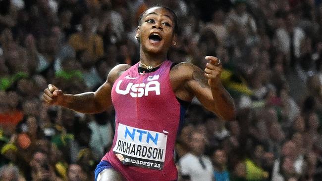 USA's Sha'Carri Richardson reacts after winning the women's 100m final during the World Athletics Championships at the National Athletics Centre in Budapest on August 21, 2023. (Photo by Jewel SAMAD / AFP)