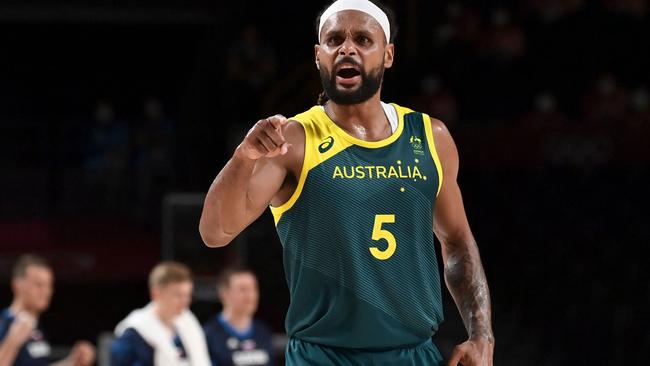 Patty Mills was in incredible touch as he led Australia to victory. (Photo by Aris MESSINIS / AFP)