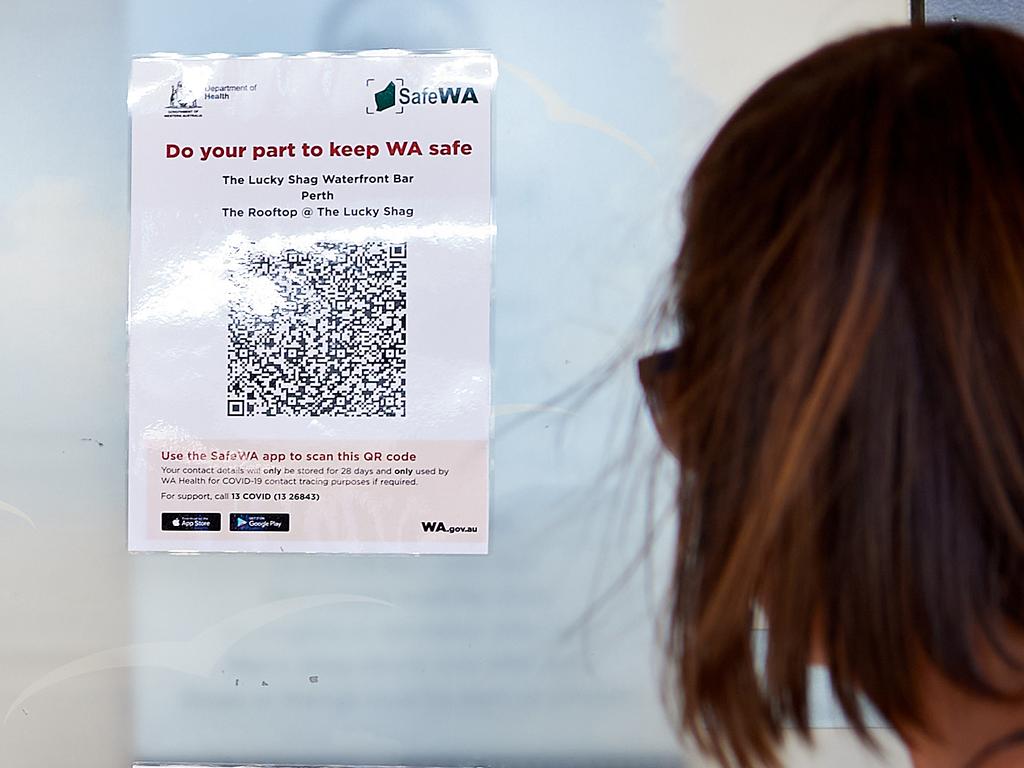 People already have to scan QR codes at places across WA and now they also have to show proof of vaccination at many venues. Picture: Stefan Gosatti/Getty Images