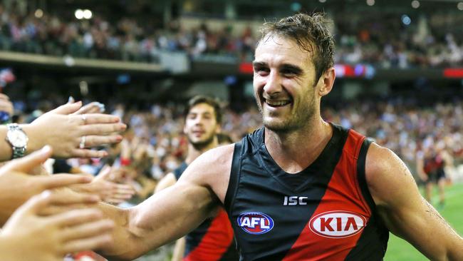 Jobe Watson hams it up with adoring fans after a win. Picture: George Salpigtidis