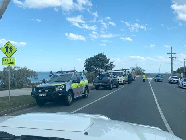 A man in his 30s has been rushed to hospital after his mobility scooter fell four metres, crashing into rocks in Redcliffe Wednesday afternoon.Photo: Dean Halpin
