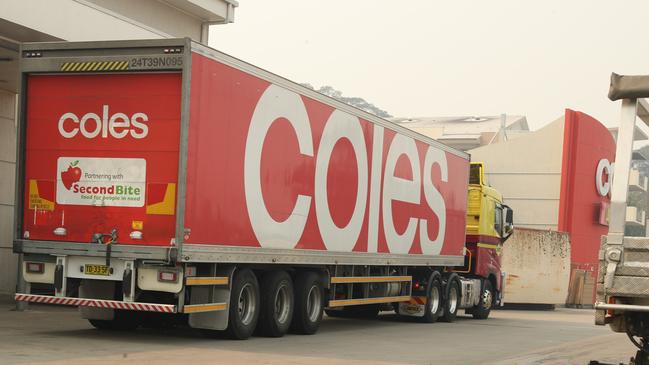 Coles trucks line up at the loading dock.