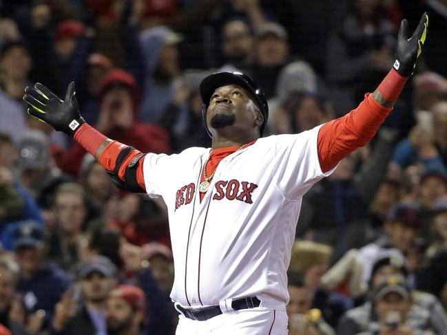 FILE - In this April 29, 2016, file photo, Boston Red Sox designated hitter David Ortiz celebrates his two-run home run against the New York Yankees during the eighth inning of a baseball game at Fenway Park, in Boston. Former Boston Red Sox slugger Ortiz was hospitalized Monday, June 10, 2019, following surgery for a gunshot wound after being ambushed by a man in a bar in his native Dominican Republic, authorities said. Dominican National Police Director Ney Aldrin Bautista Almonte said Ortiz was at the Dial Bar and Lounge in Santo Domingo around 8:50 p.m. Sunday, when a gunman approached from behind and shot him at close range. Ortiz was taken to the Abel Gonzalez clinic, where he underwent surgery, and his condition was stable, Bautista said. (AP Photo/Elise Amendola, File)