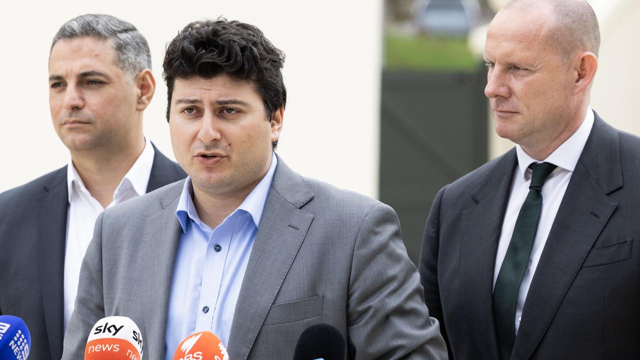 Will Nemesh (Centre), Darcy Bryne (Right) and Ned Mannoun speak at a press conference at Bondi Pavilion. Photographer: Ted Lamb