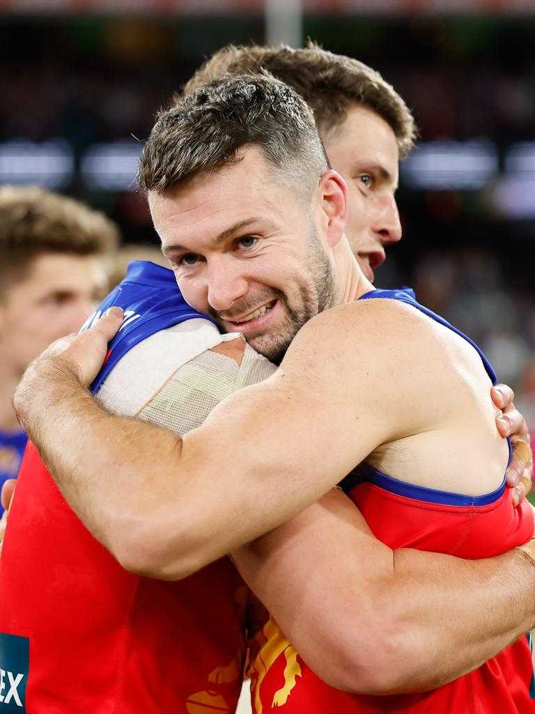 Conor McKenna and Jarrod Berry celebrate the Lions AFL Preliminary Final win. Picture: Dylan Burns