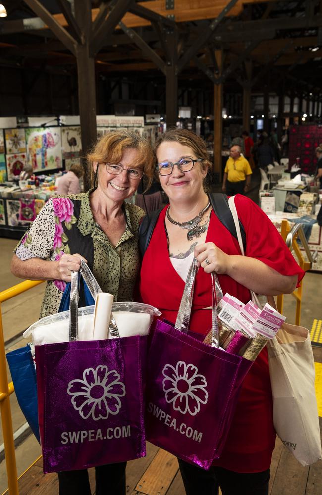 Angela Brown (left) and Ashleigh Dowd at Craft Alive at The Goods Shed, Saturday, August 24, 2024. Picture: Kevin Farmer