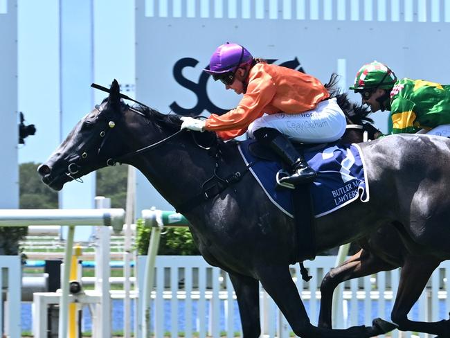 El Morzillo storms over the top of her rivals to win the QTIS 2YO Handicap for jockey Cejay Graham. Picture: Grant Peters - Trackside Photography