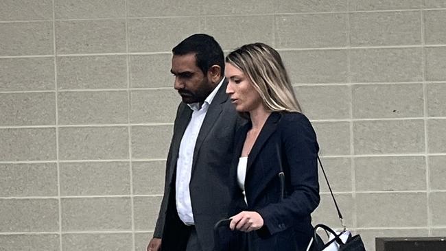 Raminder Kahlon (left) leaves the ACT Law Courts with his lawyer. Picture: Julia Kanapathippillai