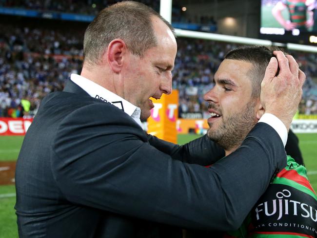 South Sydney's Adam Reynolds and Michael Maguire celebrate winning the Grand Final during the 2014 NRL Grand Final between the South Sydney Rabbitohs and the Canterbury Bankstown Bulldogs at ANZ Stadium .Picture Gregg Porteous