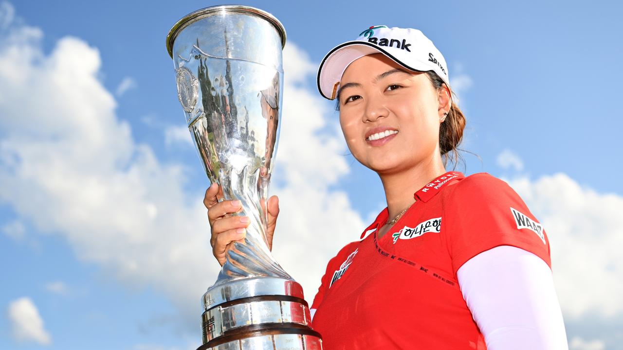 Tournament winner Minjee Lee poses for a photo with her trophy. (Photo by Stuart Franklin/Getty Images)