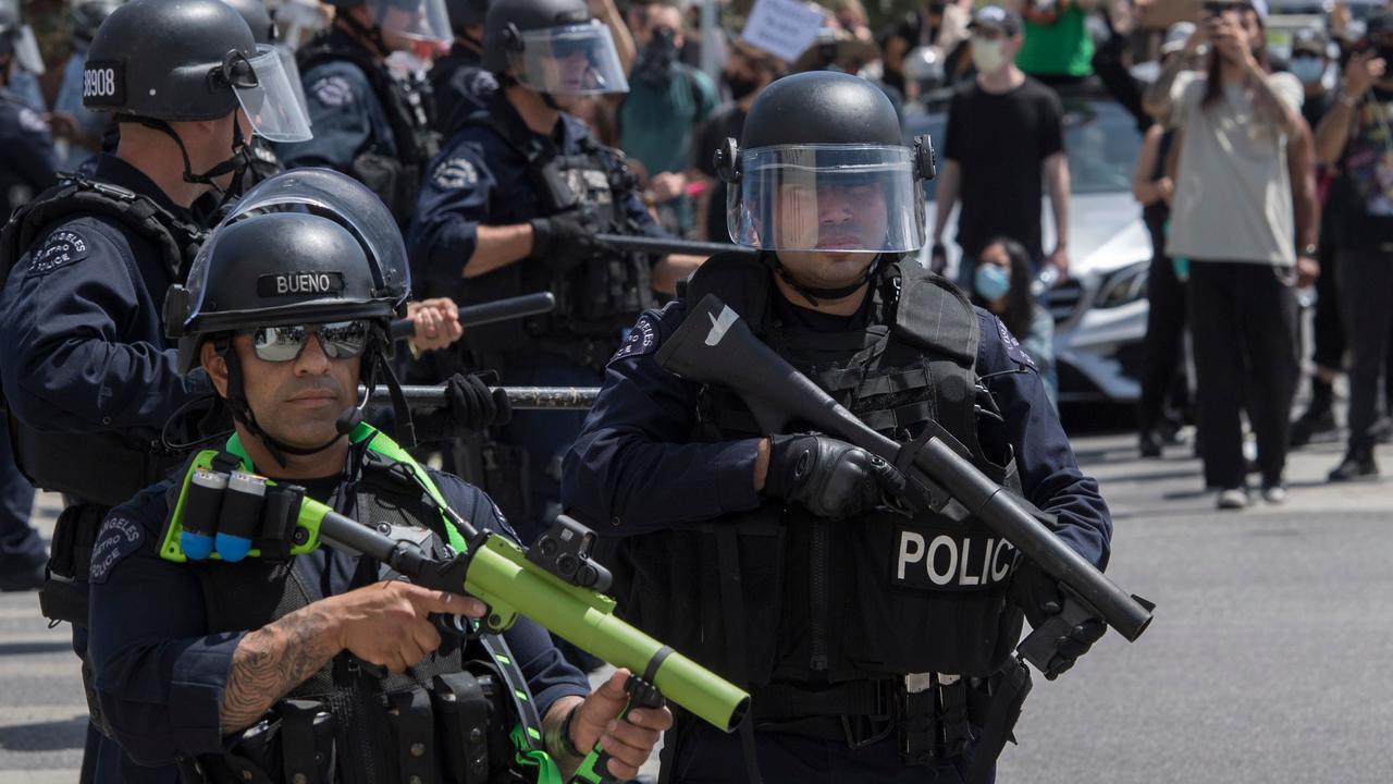 Police officers armed with rubber bullet launchers in Los Angeles over the weekend. Picture: Mark Ralston/AFP