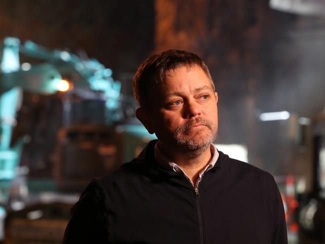 Jarrod Rawlins performance curator. Work in Macquarie Street Hobart on the hole that will house the chamber performance artist Mike Parr will live in for 72 hours during Dark Mofo. Picture: NIKKI DAVIS-JONES