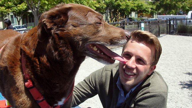 Whistle co-founder Ben Jacobs with his dog