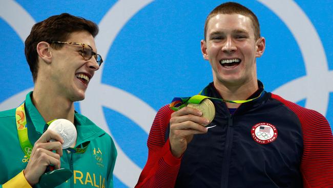 Australian backstroker Mitch Larkin celebrates a silver medal next to America’s Ryan Murphy.