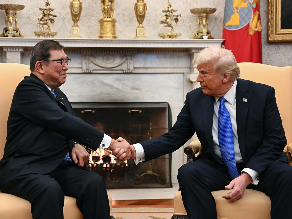 US President Donald Trump shakes hands with Japanese Prime Minister Shigeru Ishiba in the Oval Office of the White House in Washington, DC. Picture: AFP