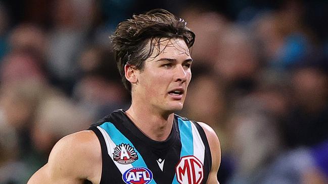 ADELAIDE, AUSTRALIA - APRIL 26: Connor Rozee of the Power taken from the ground with hamstring injury during the 2024 AFL Round 07 match between the Port Adelaide Power and the St Kilda Saints at Adelaide Oval on April 26, 2024 in Adelaide, Australia. (Photo by Sarah Reed/AFL Photos via Getty Images)