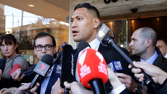 Israel Folau speaking to the media outside the Fair Work Commission earlier this year. Picture: Jonathan Ng