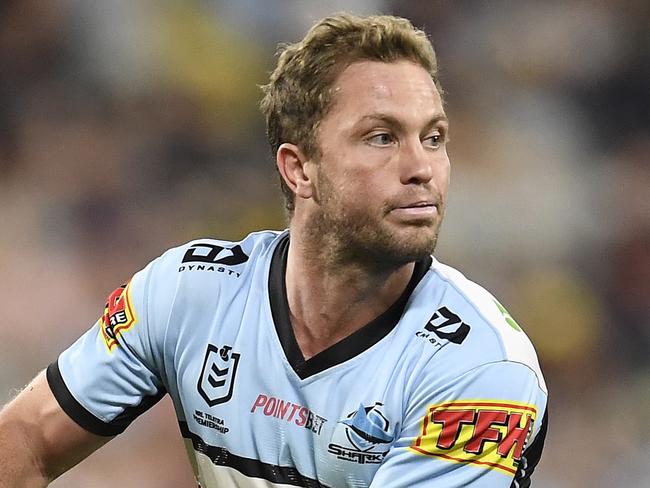 TOWNSVILLE, AUSTRALIA - JUNE 18:  Matt Moylan of the Sharks passes the ball during the round 15 NRL match between the North Queensland Cowboys and the Cronulla Sharks at QCB Stadium, on June 18, 2021, in Townsville, Australia. (Photo by Ian Hitchcock/Getty Images)