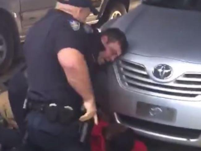 This still from mobile phone footage appears to show police officers pinning down Alton Sterling before shooting him multiple times.