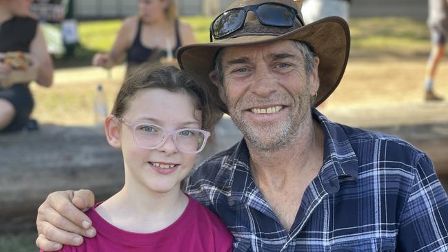 Imogen Ward and Craig Williams, from Brisbane, enjoy day one of the 2024 Gympie Muster, at the Amamoor State Forest on August 22, 2024.