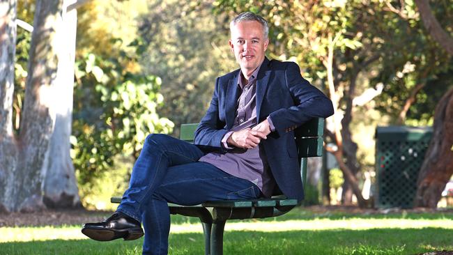 Minister Geoff Tacon outside Moorooka Presbyterian Church, which has started Sunday morning podcasts for the community to connect and keep in touch. Picture: AAP/John Gass