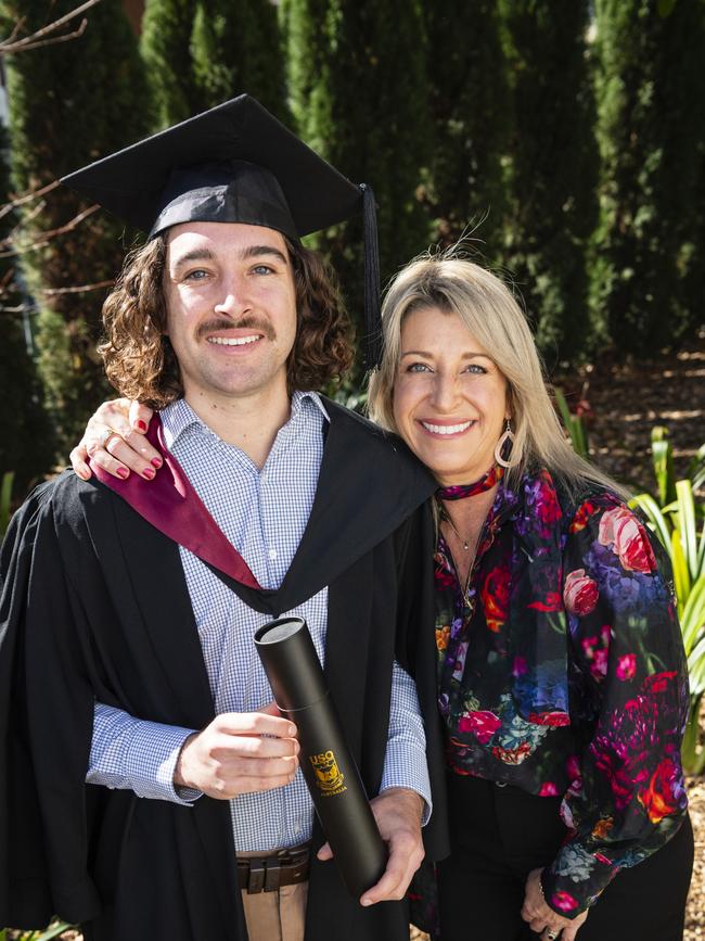 Bachelor of Engineering Science (Mechanical Engineering) graduate Brad Chambers with mum Michelle Oxley-Chambers at his UniSQ graduation ceremony at Empire Theatres, Wednesday, June 28, 2023. Picture: Kevin Farmer