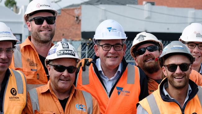 Former Victorian premier Daniel Andrews with workers at a construction site in Melbourne in April last year. The Labor government has been on a spending binge for close to a decade. Picture: NCA NewsWire / Luis Ascui