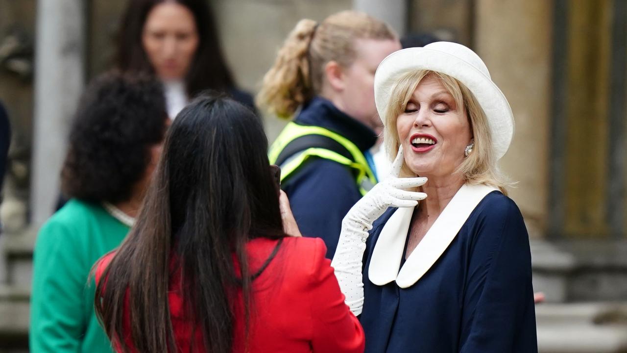 Dame Joanna Lumley poses for a photograph as she arrives at Westminster Abbey. Picture: Getty Images