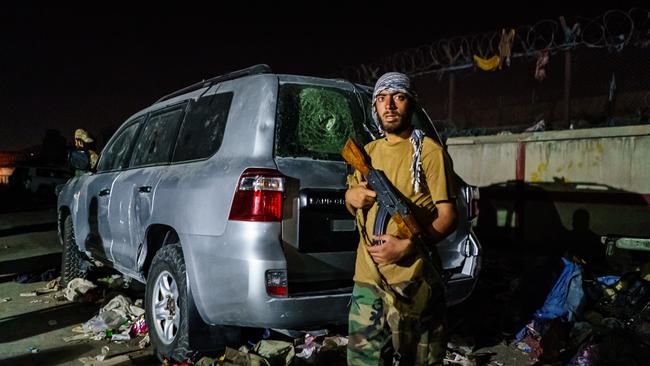 A Taliban fighter guards a checkpoint outside the airport in Kabul, Afghanistan, Picture: Marcus Yam/ Los Angeles Times