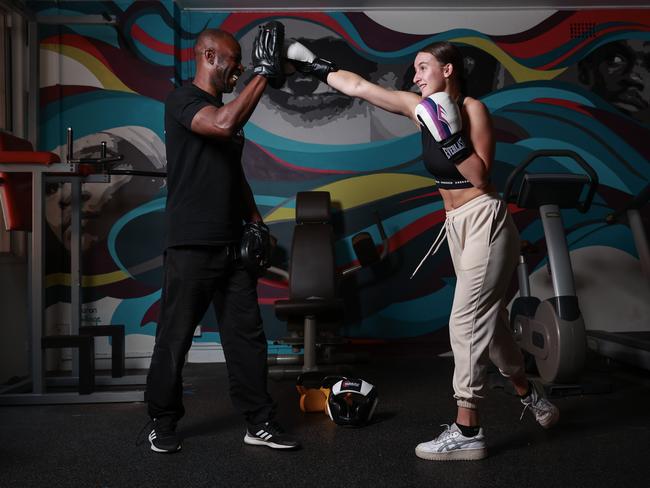 Emma’s fitness coach and mentor, Tony Akindoyin, helps her train. Picture: Justin Lloyd.