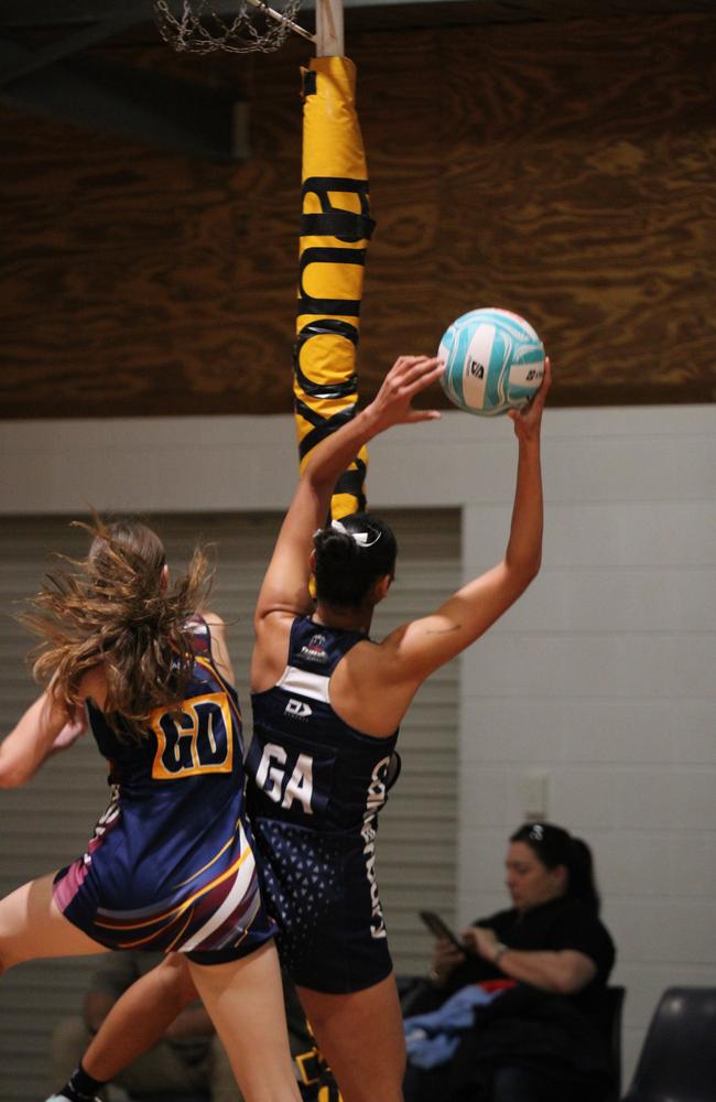 Netball action at QISSN 2024. Canterbury College v Good Shepherd Lutheran College