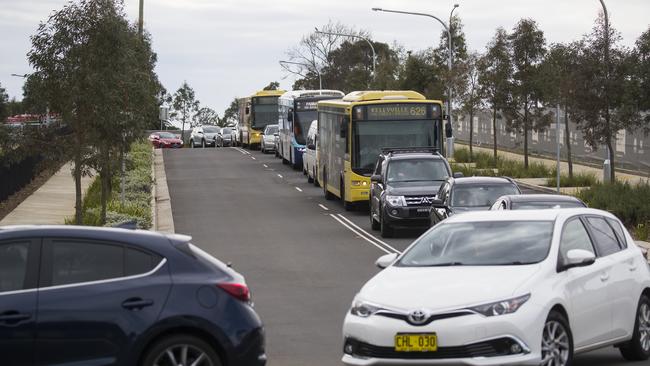 Cars line up for the COVID-19 testing clinic at Castle Hill Showground today. Picture: Dylan Robinson