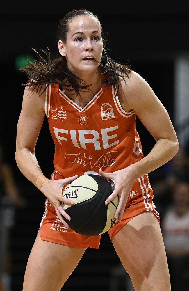 TOWNSVILLE, AUSTRALIA – FEBRUARY 26: Alicia Froling of the Fire looks to pass the ball during game two of the WNBL Semi Final series between Townsville Fire and Perth Lynx at Townsville Entertainment Centre, on February 26, 2025, in Townsville, Australia. (Photo by Ian Hitchcock/Getty Images)