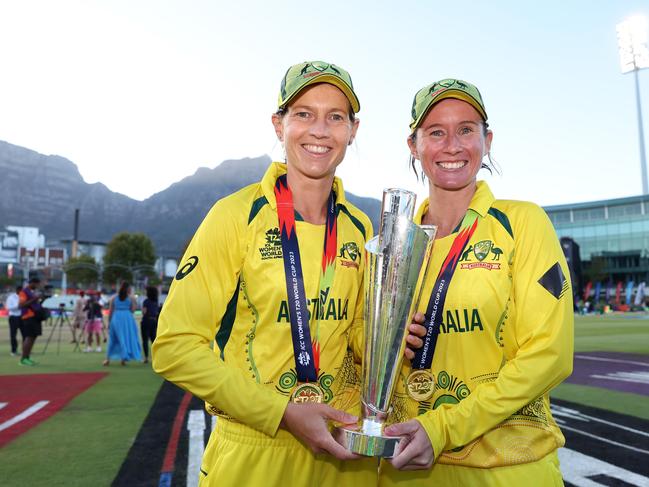 Meg Lanning and Beth Mooney lift the ICC Women's T20 World Cup last year. Picture: Getty