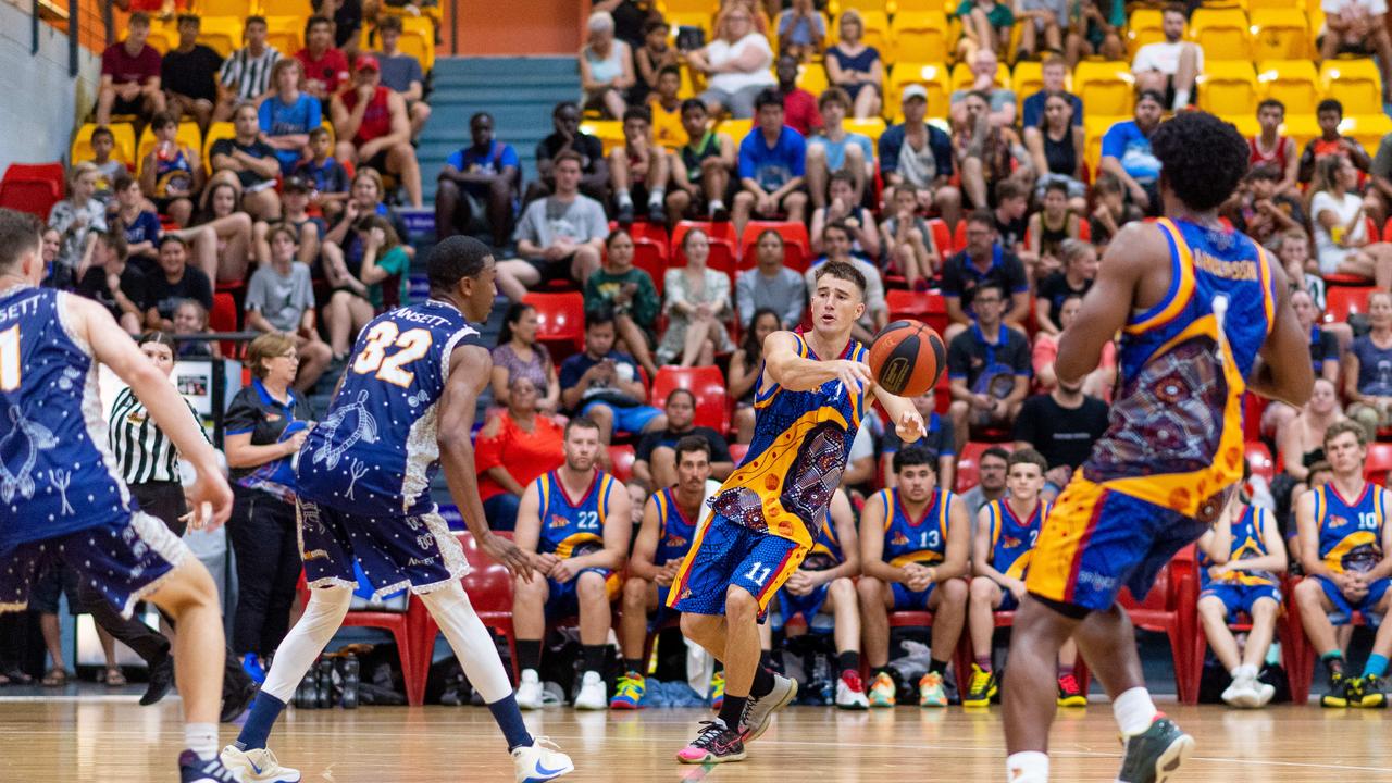 Joel Stevens with a no-look pass. Darwin Basketball Men's Championship Round 20: Ansett v Tracy Village Jets. Picture: Che Chorley