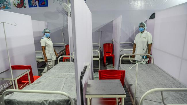 Medical staff at the Tata Memorial Centre cancer hospital inspect the arrangements at a temporary facility which screens patients for COVID-19. Picture: AFP