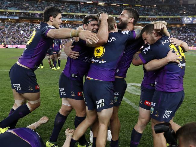 Melbourne Storm players celebrate at full time after defeating the North Queensland  Picture. Brett Costello