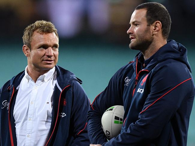 Jake Friend and Boyd Cordner of the Roosters watch on during the warm up ahead of the Round 24 NRL match between the Sydney Roosters and the Penrith Panthers at the SCG in Sydney, Saturday, August 31, 2019. (AAP Image/Dan Himbrechts) NO ARCHIVING, EDITORIAL USE ONLY