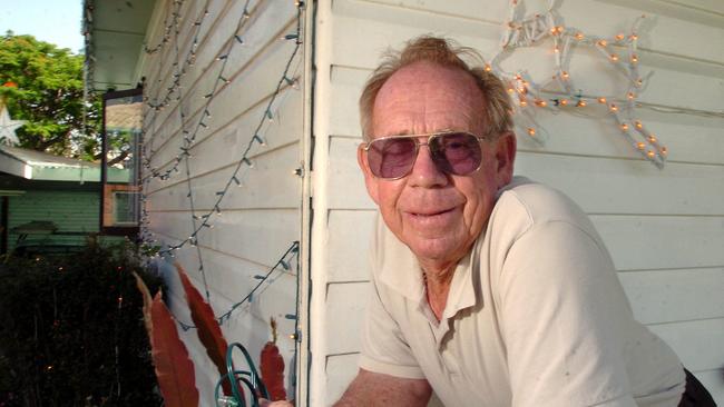 George Litfin, pictured in 2005 with his house and his beloved Christmas lights. Picture: Jodie Richter