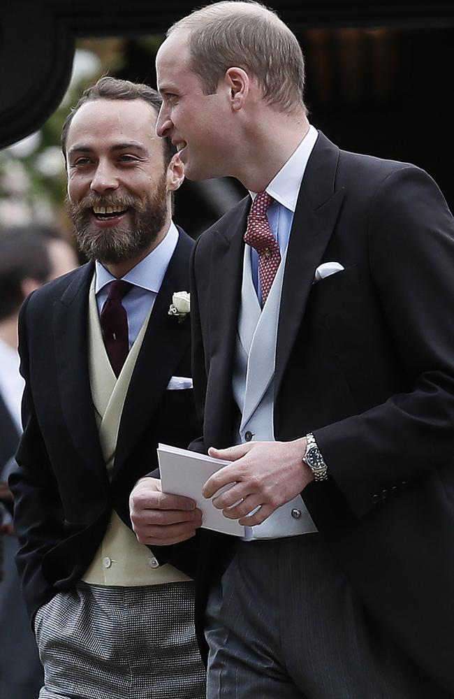 Wills talks to James Middleton as they file out into the church grounds.